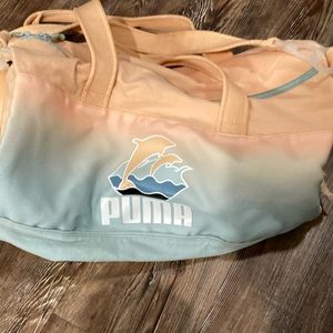 Pink dolphin puma duffle
